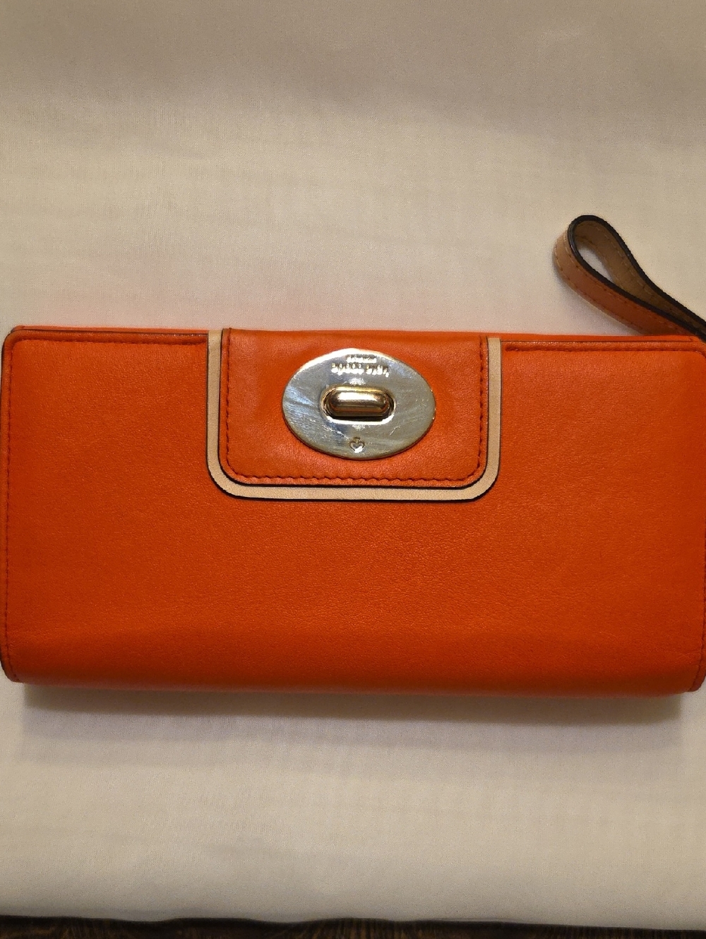 Katw Spade Orange Leather Wristlet Wallet with Turn-Lock Closure